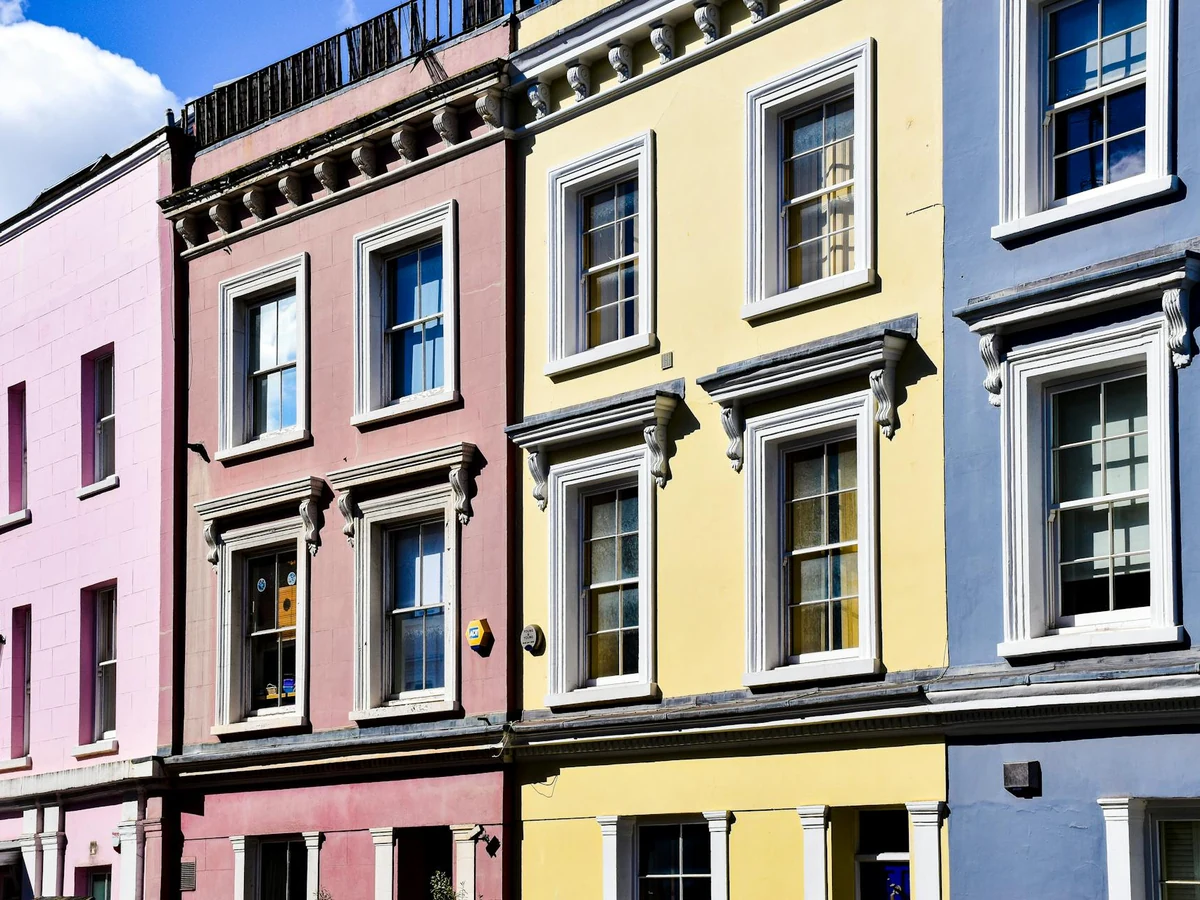 Colourful terraced house exterior painting in Cheltenham by Cheltenham Decorators