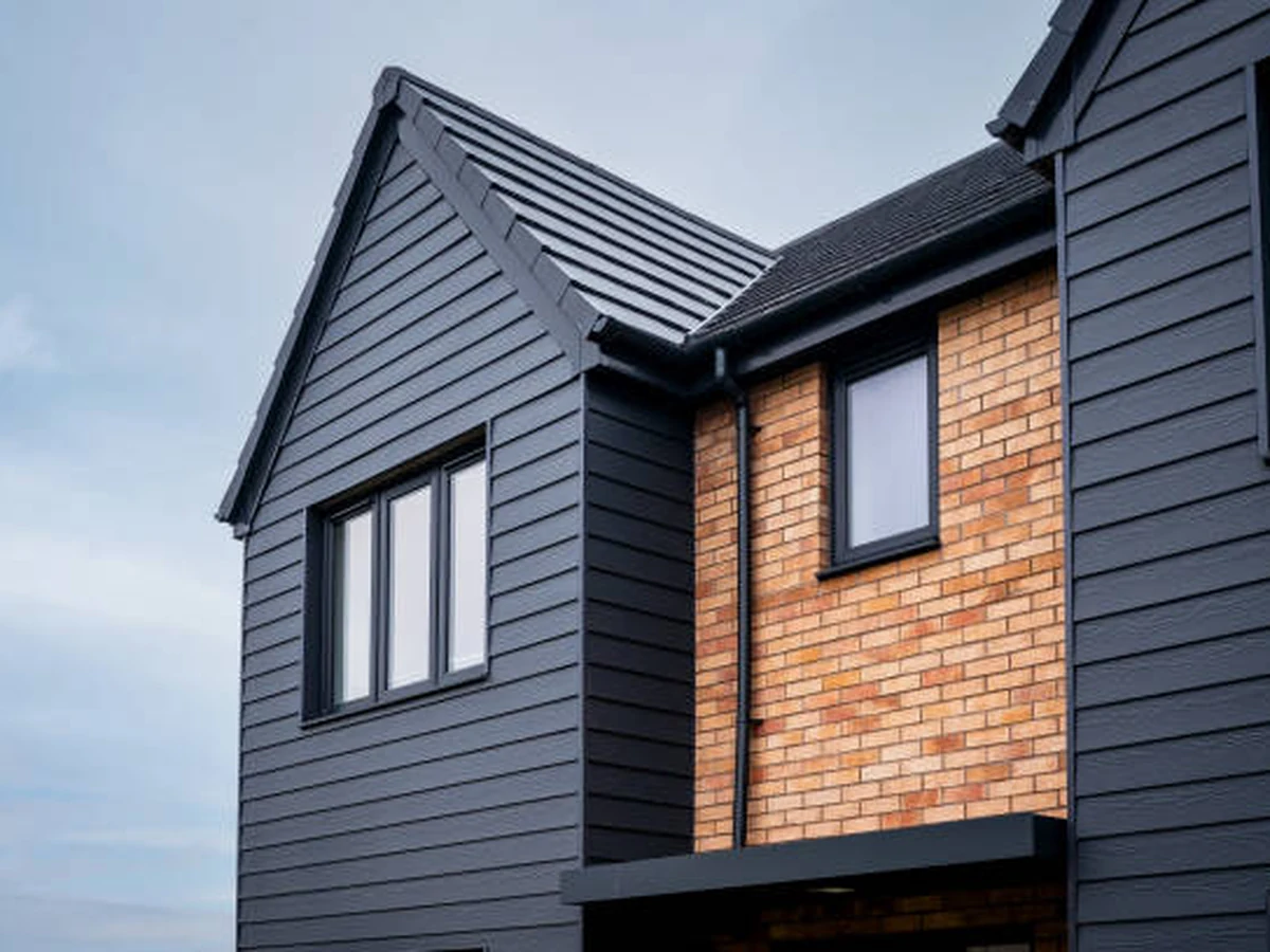 Modern dark-painted house exterior by Cheltenham Decorators