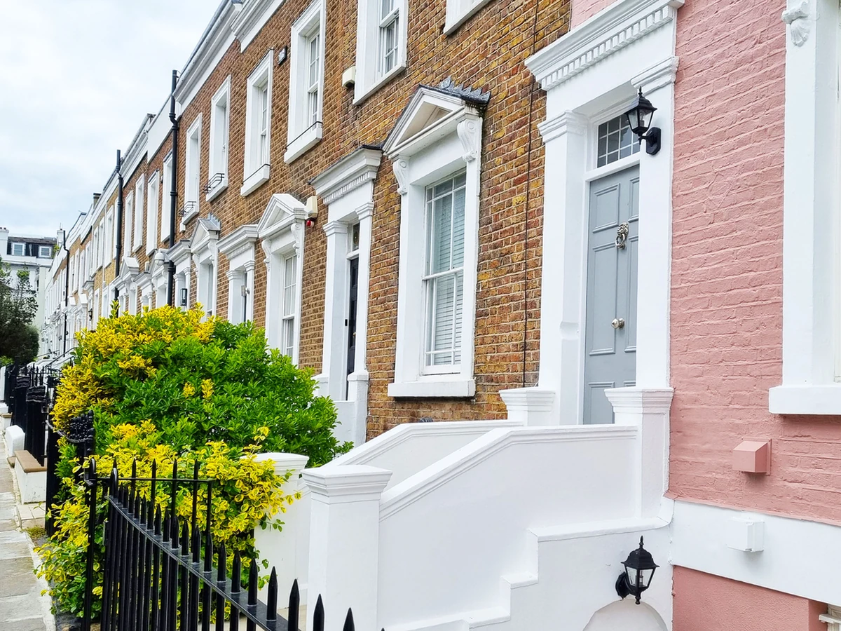 Row of painted period terraced properties in Cheltenham, Lansdown area exterior decorating