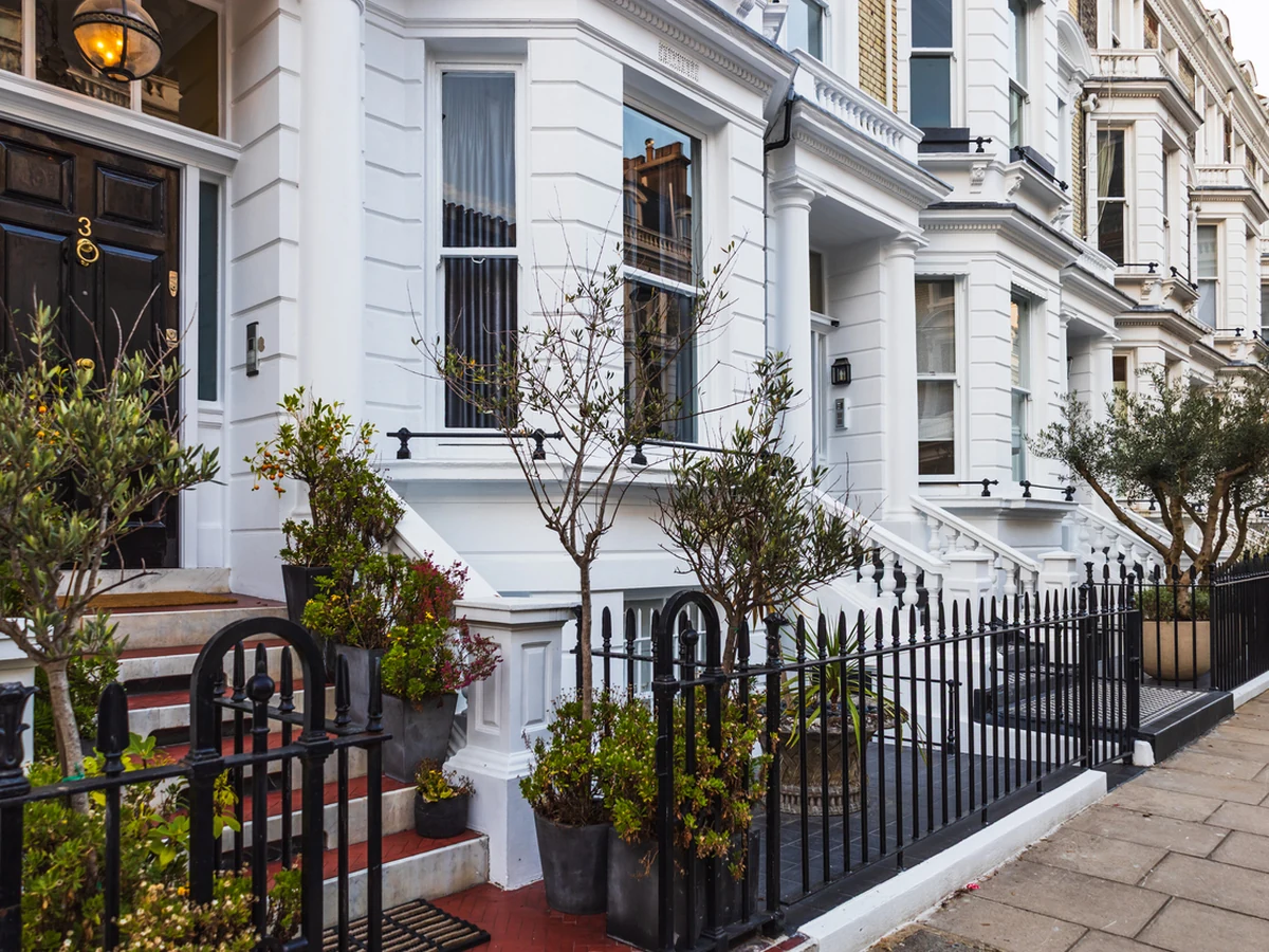 White Victorian townhouses exterior painting in Cheltenham by Cheltenham Decorators
