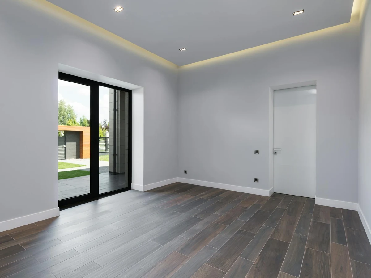Interior painting of empty grey room in Cheltenham by Cheltenham Decorators