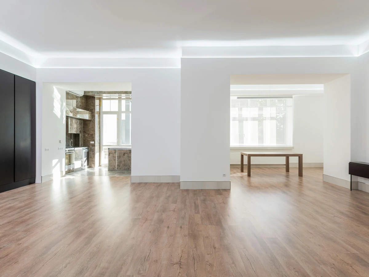 Interior painting in an open plan room by Cheltenham Decorators in Prestbury