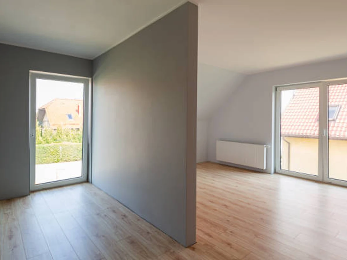 Interior painting of empty grey room in Cheltenham by Cheltenham Decorators