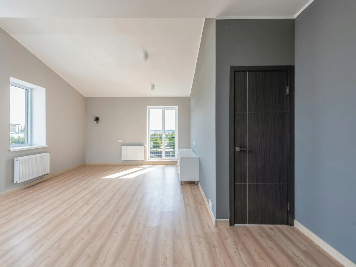 Empty room painted grey by Cheltenham Decorators in Tewkesbury
