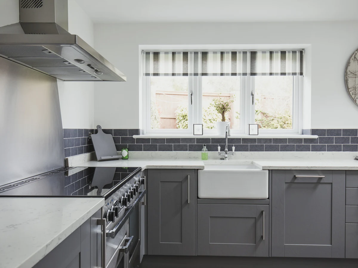 Contemporary grey shaker kitchen cabinet painting in Cheltenham by Cheltenham Decorators