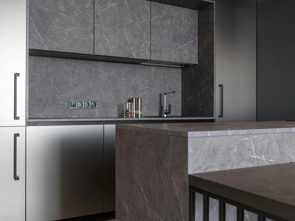 Grey stone-effect kitchen cabinet painting in Cheltenham by Cheltenham Decorators