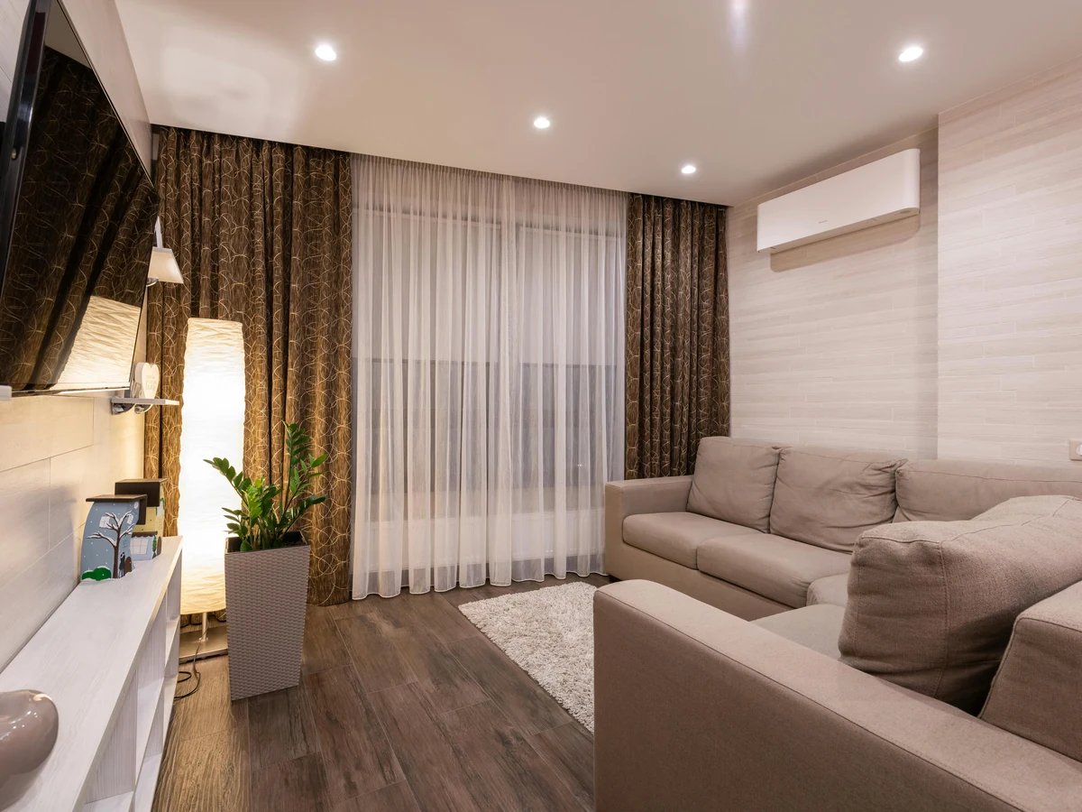 Beige living room painted by Cheltenham Decorators, neutral tones and clean finish