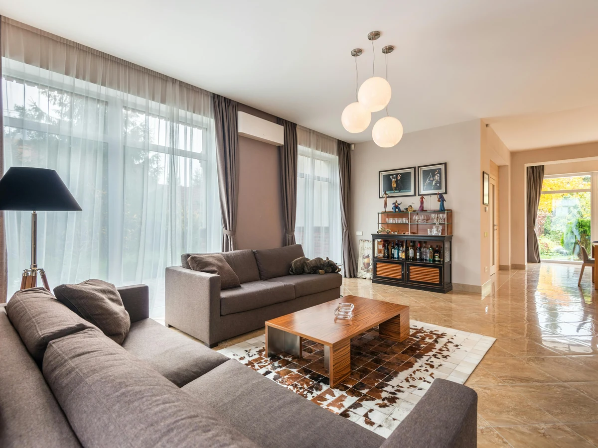 Living room painting in a spacious Tivoli property by Cheltenham Decorators