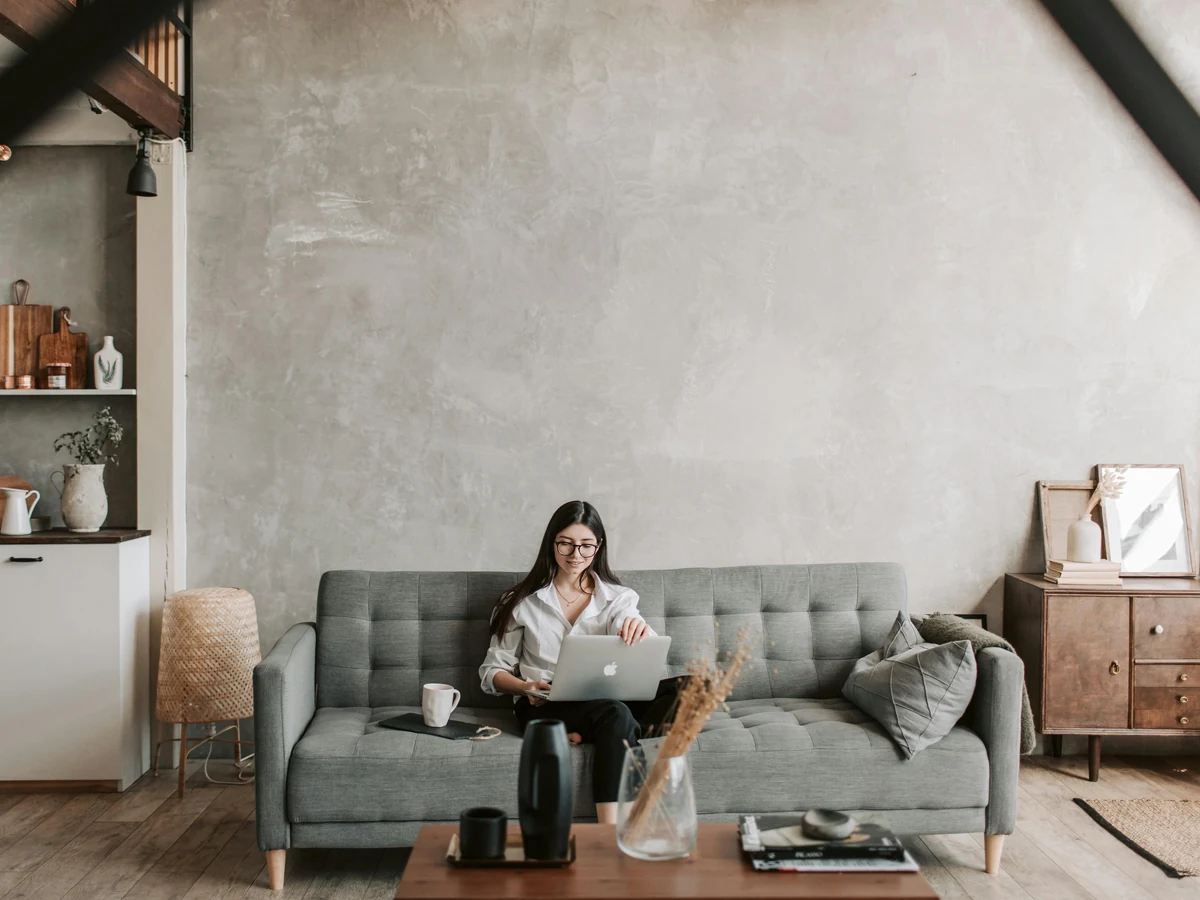 Woman working at laptop in freshly painted home office room in Cheltenham