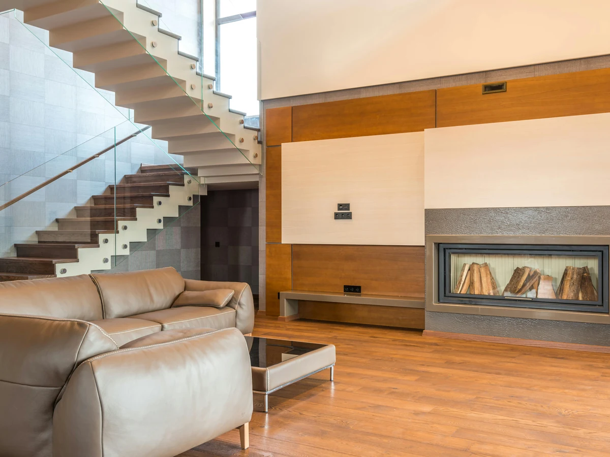 Staircase and living room painting in a Tivoli property by Cheltenham Decorators