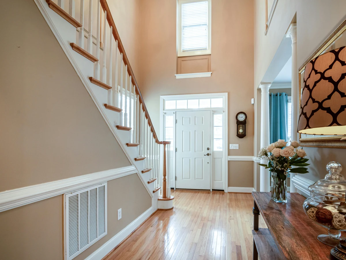 Two-tone staircase painting in Cheltenham by Cheltenham Decorators