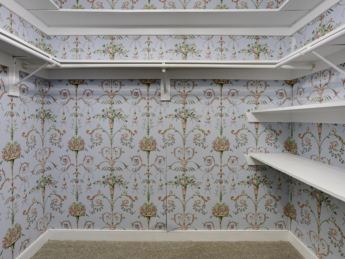 Fully wallpapered closet interior in Stroud by Cheltenham Decorators