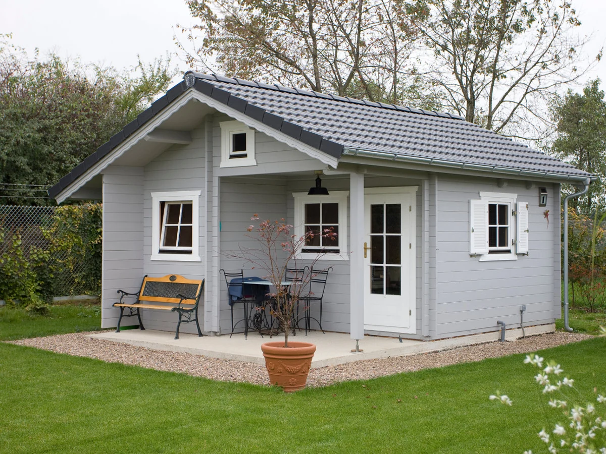 Wood painting grey log cabin in Cheltenham by Cheltenham Decorators, professional wood painters